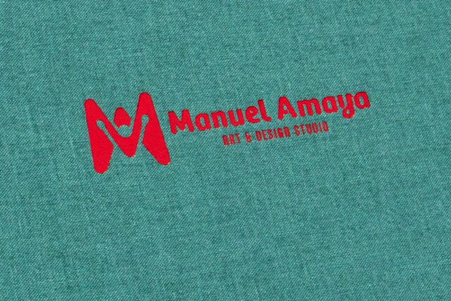 Red Foil Debossing on Aqua Cloth