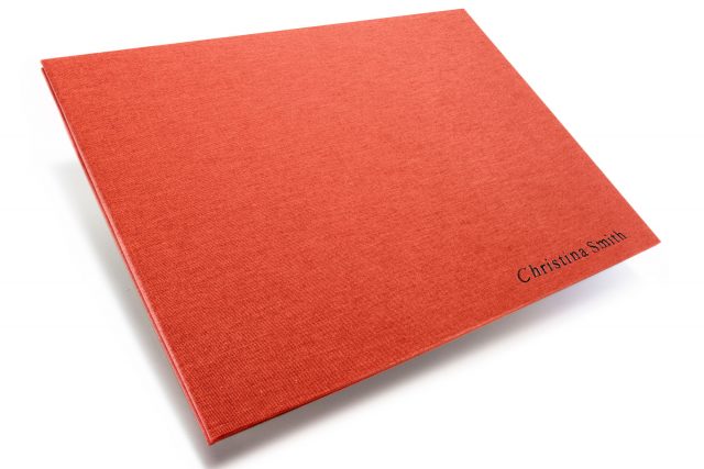 Black Foil Letterpress on Red Peach Cloth Portfolio